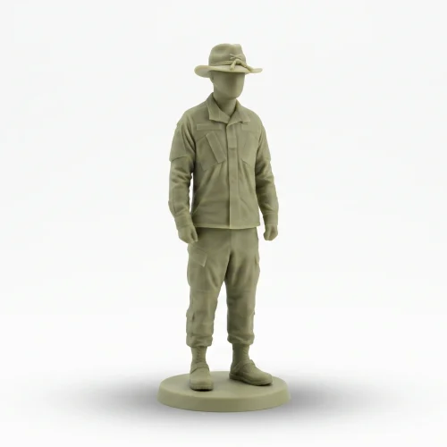 greenish-khaki miniature military figurine of a modern soldier wearing modern utility gear and a Cavalry Stetson style hat.